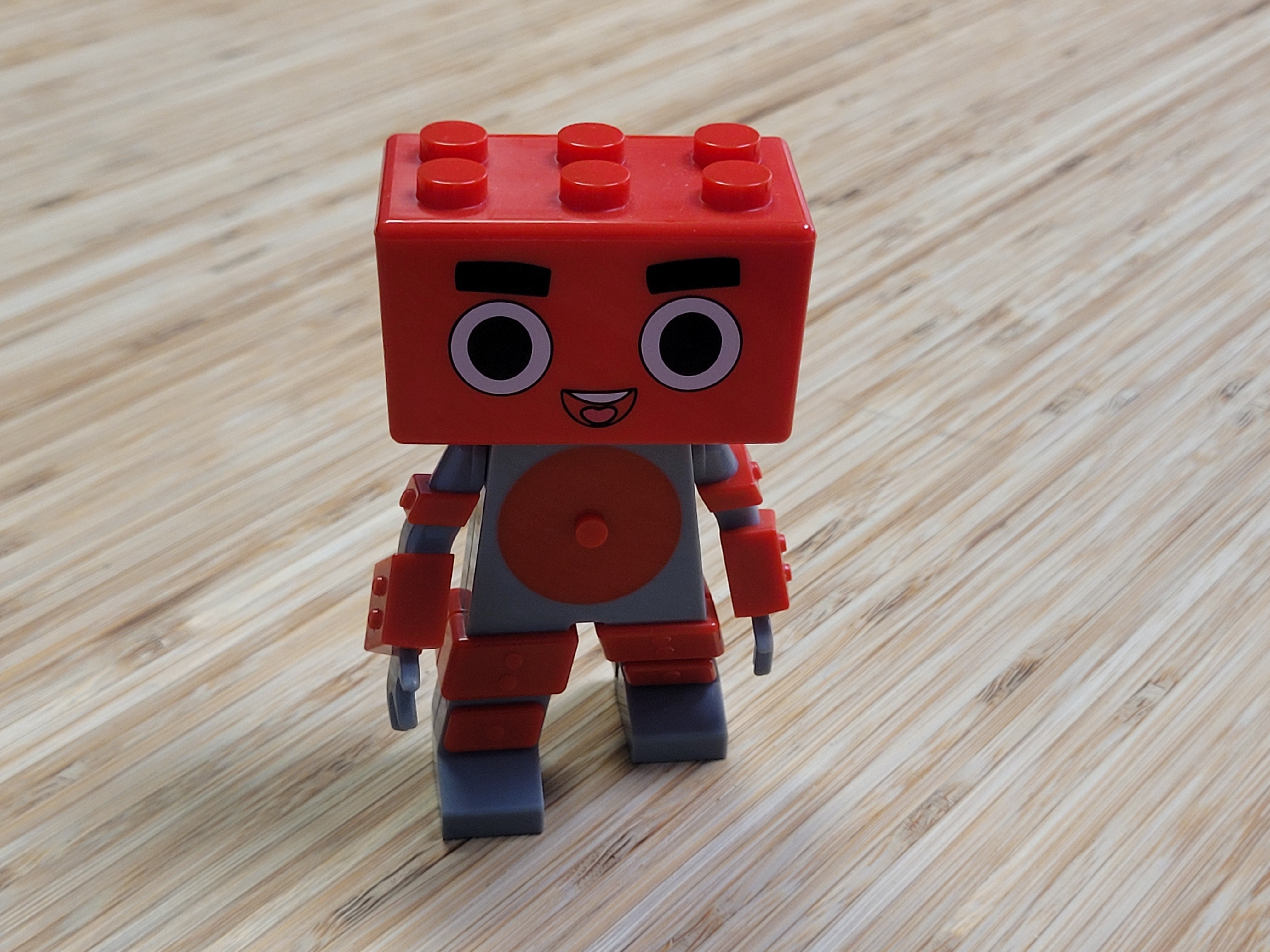 CPSC-compliant children's character with LEGO compatibility